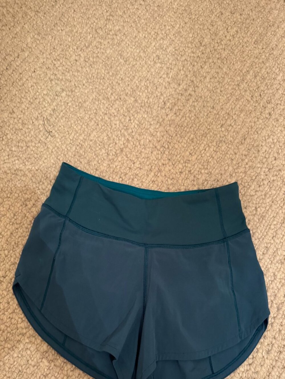 Lululemon size 2 low rise speed up short, blue color